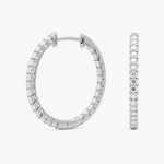 Crafted in 14K/18K gold or platinum, these inside-out hoops feature 2.00 ctw lab grown diamonds, prong-set with hinged snap closure and rhodium finish | Adorn By You